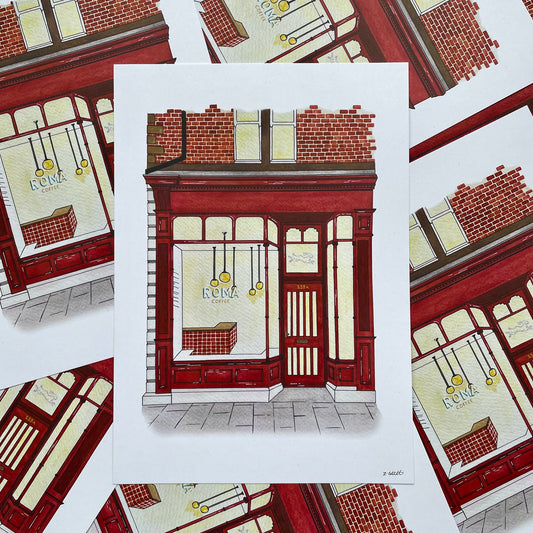 Art print of Roma coffee Heaton surrounded by other art prints