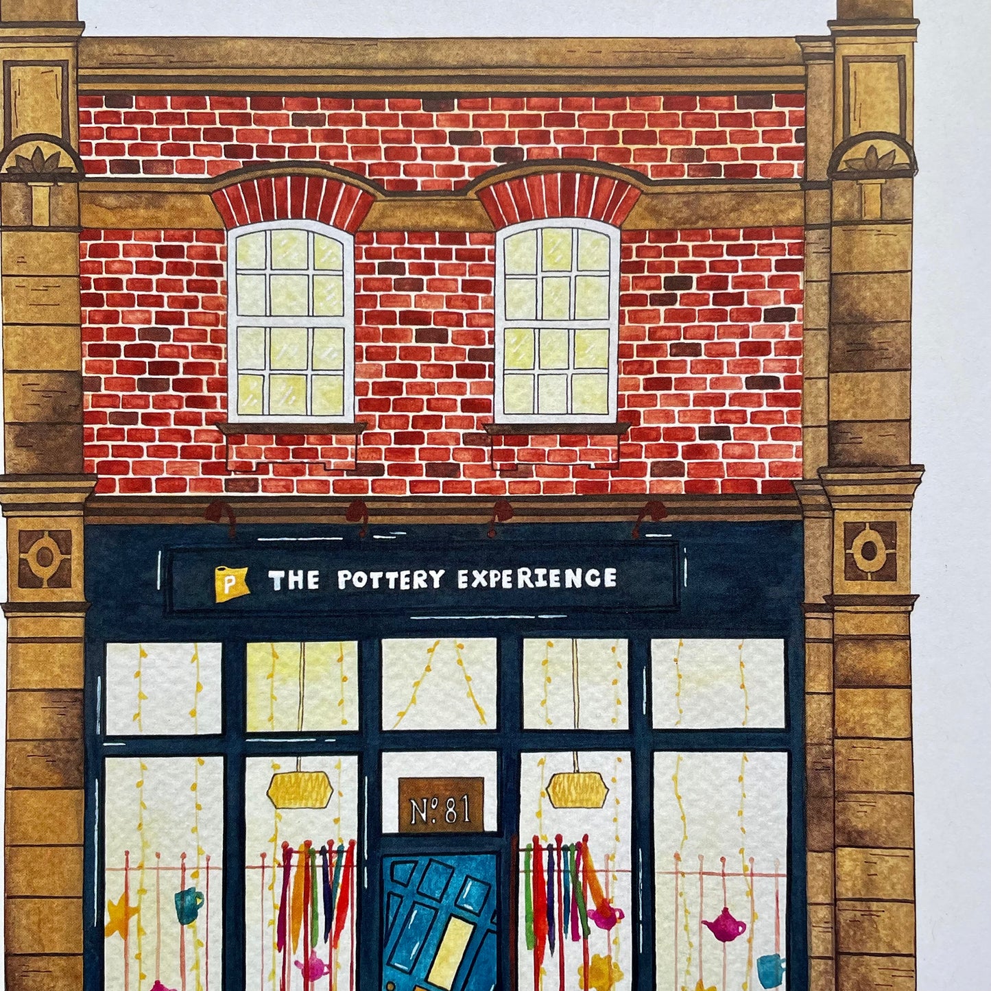 Illustration of a brick building facade with 'The Pottery Experience' sign.