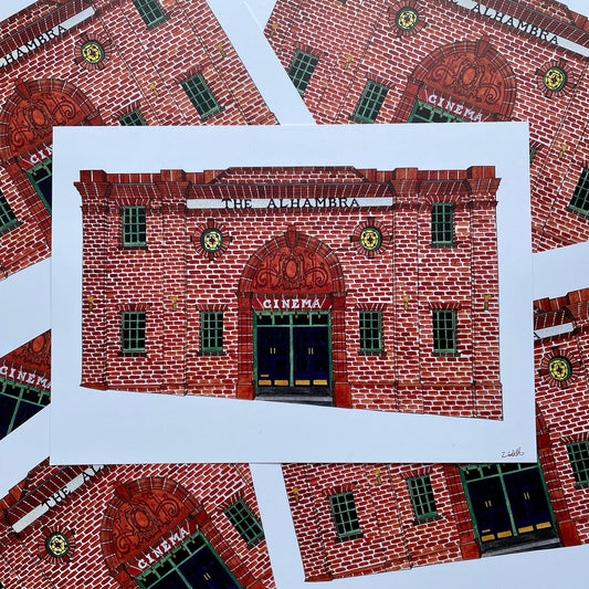 Illustration of a red brick building labeled 'The Alhambra Cinema' on a white background.