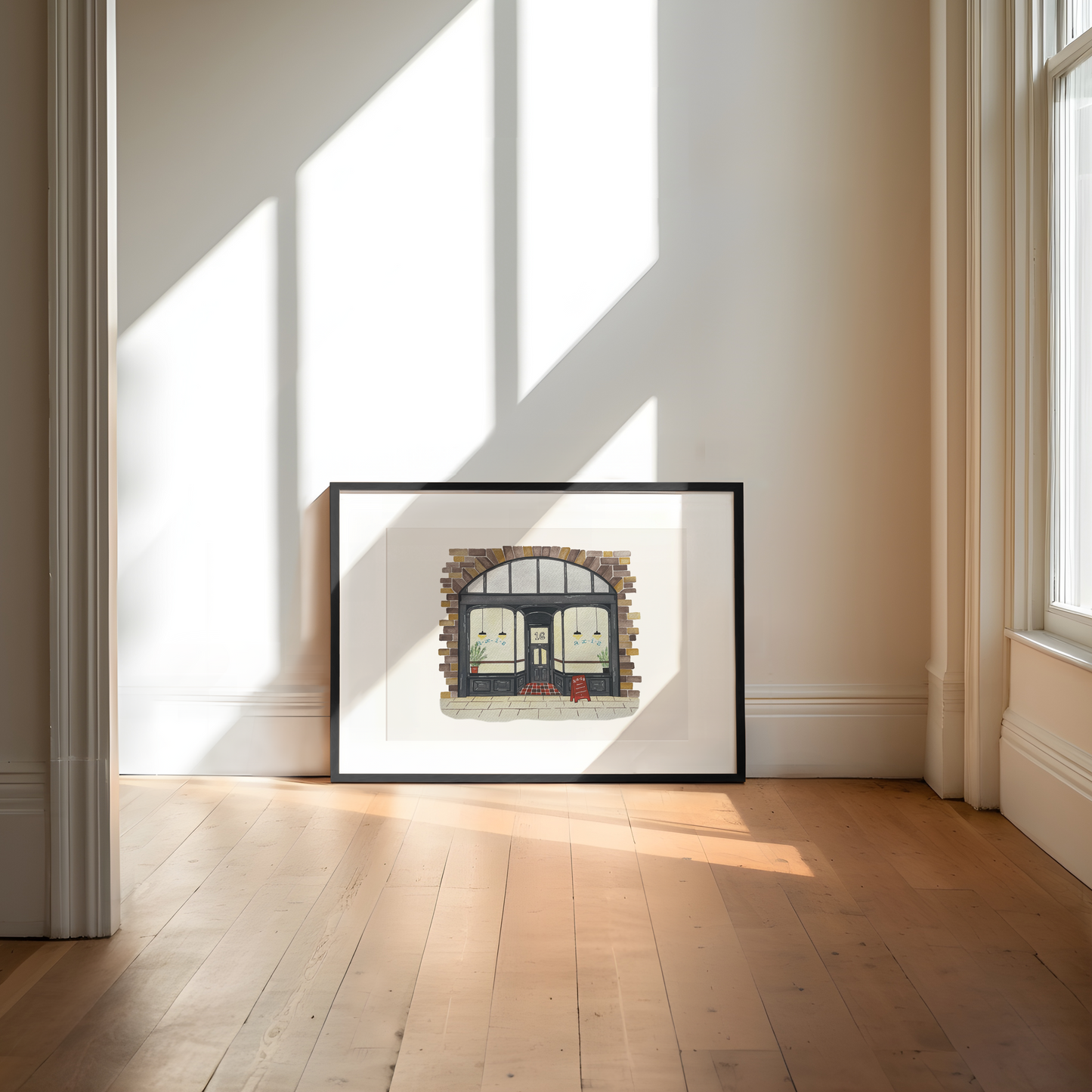 Framed artwork of Axis Bar, Gateshead on a wall with sunlight casting shadows