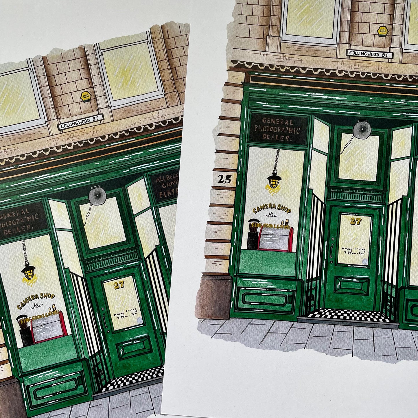 Illustration of Camera shop Newcastle with green shop fronts and architectural details.