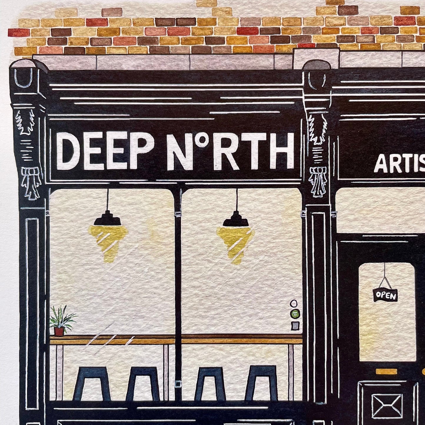 A stylized illustration of a storefront with the large sign 'DEEP NORTH' above windows and seating, alongside a door marked 'ARTIS' and a hanging 'OPEN' sign. The scene has a hand-drawn or textured art-print look with black, cream, yellow, brown, and orange tones.