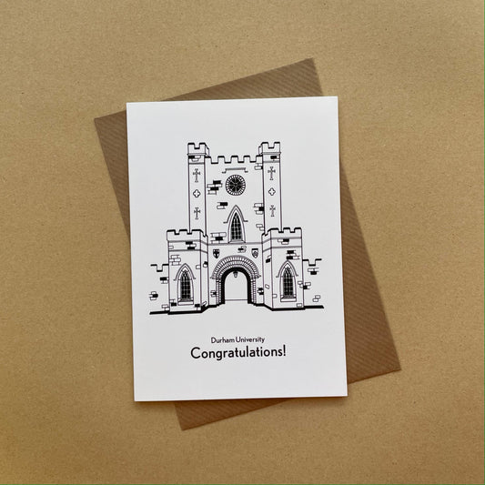Greeting card with a Durham university illustration and 'Congratulations!' text on a brown background