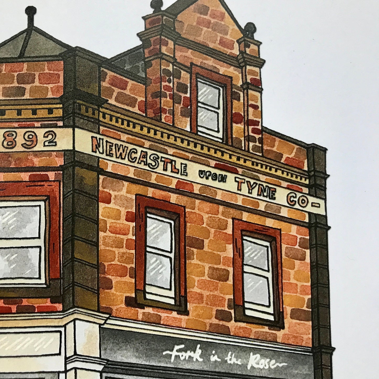 Illustration of a brick building with 'Newcastle upon Tyne Co' signage.