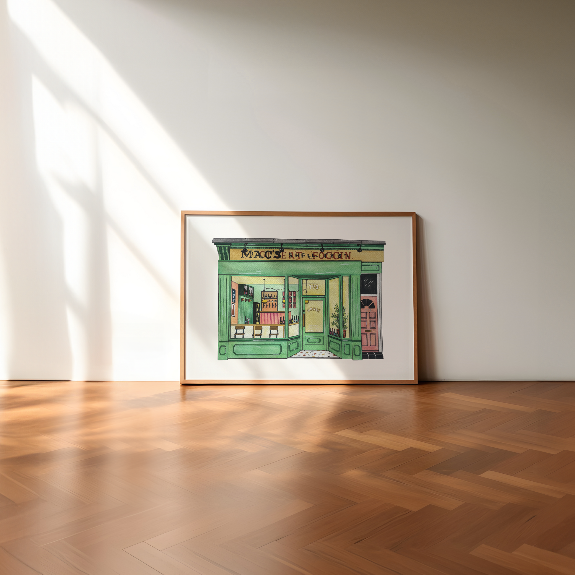 Framed artwork of House Bar on a wooden floor with sunlight casting shadows.