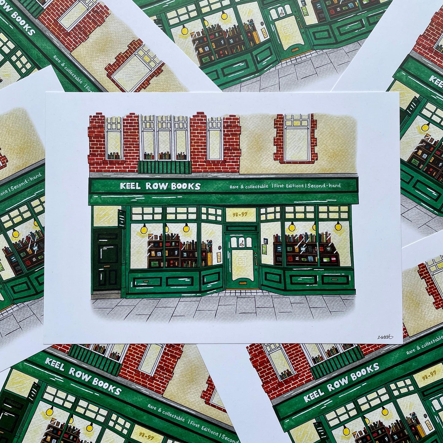 Illustration of a bookshop named 'Keel Row Books' surrounded by similar illustrations.