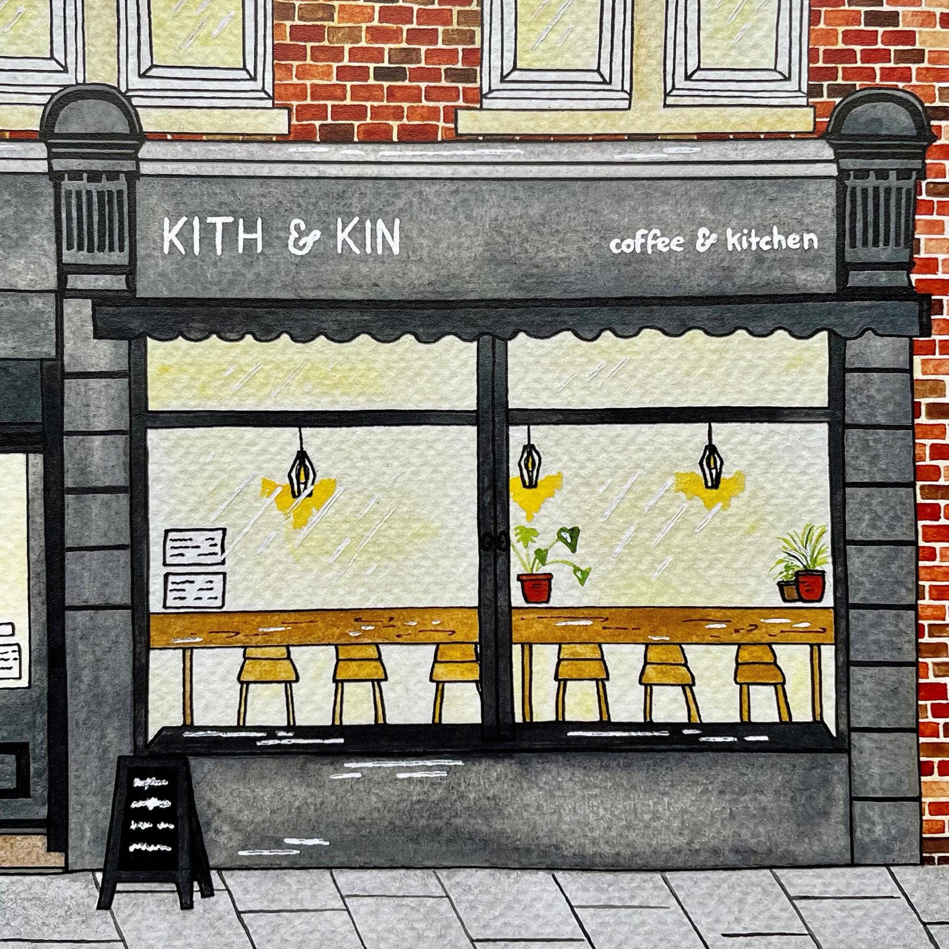 Illustration of a coffee shop named 'Kith & Kin' with a brick facade.