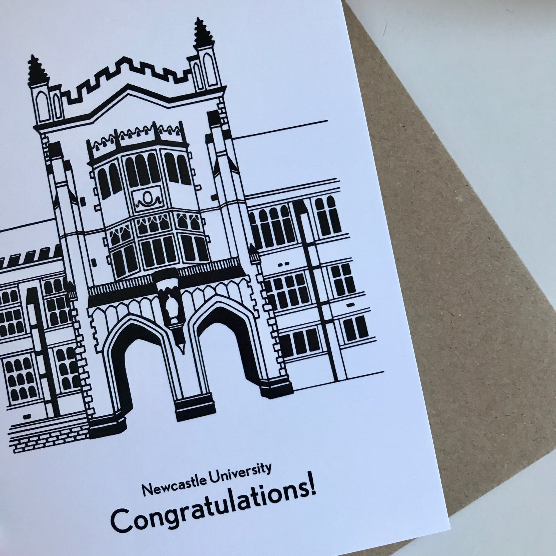 Greeting card with Newcastle University building illustration and 'Congratulations!' text on a white background.