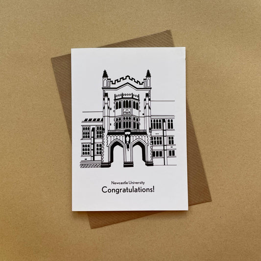 Greeting card with Newcastle University building illustration and 'Congratulations!' text on a brown background