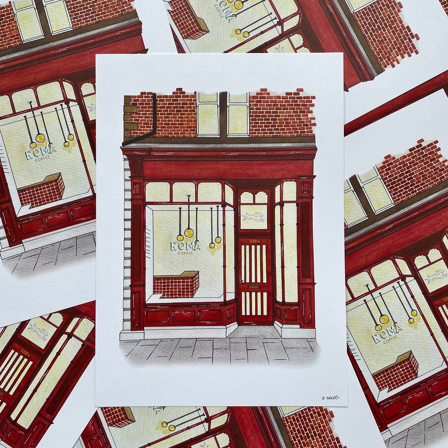 Art print of Roma coffee Heaton surrounded by other art prints