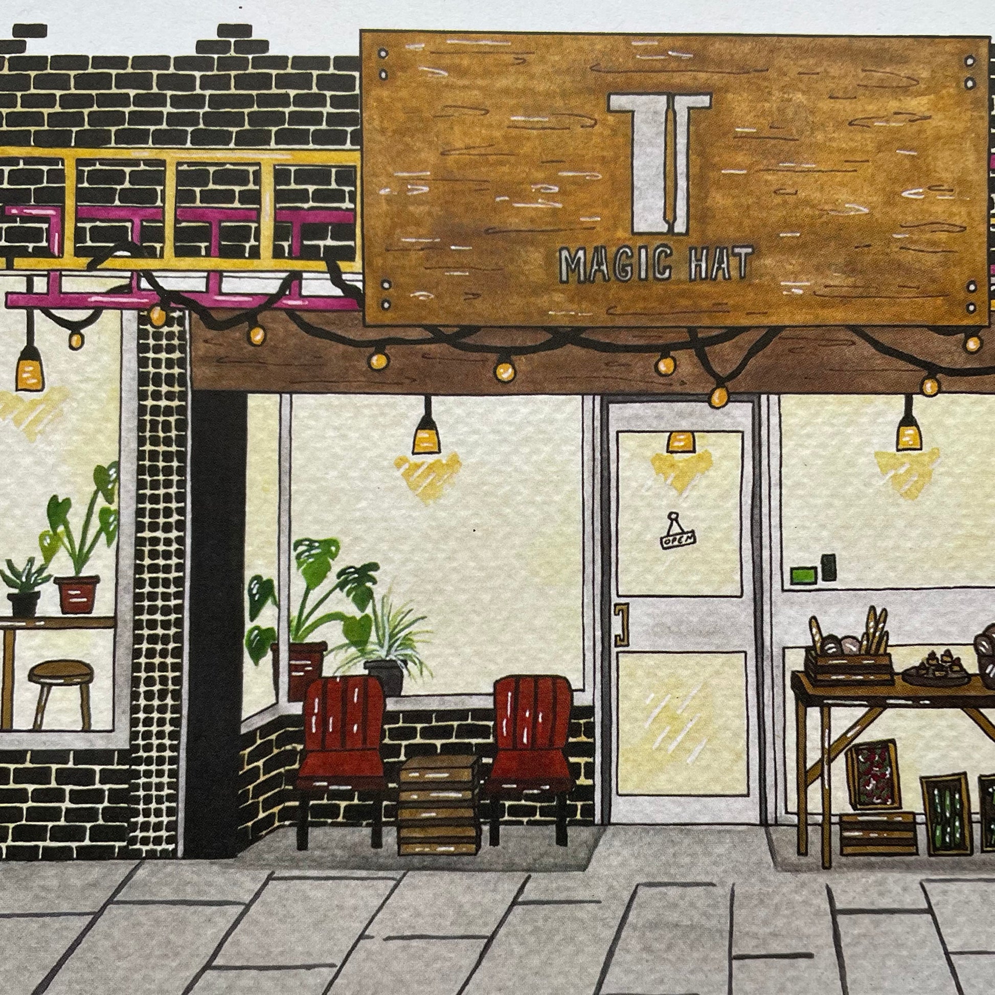 Illustration of The Magic hat cafe front with 'T Magic Hat' sign and interior view.