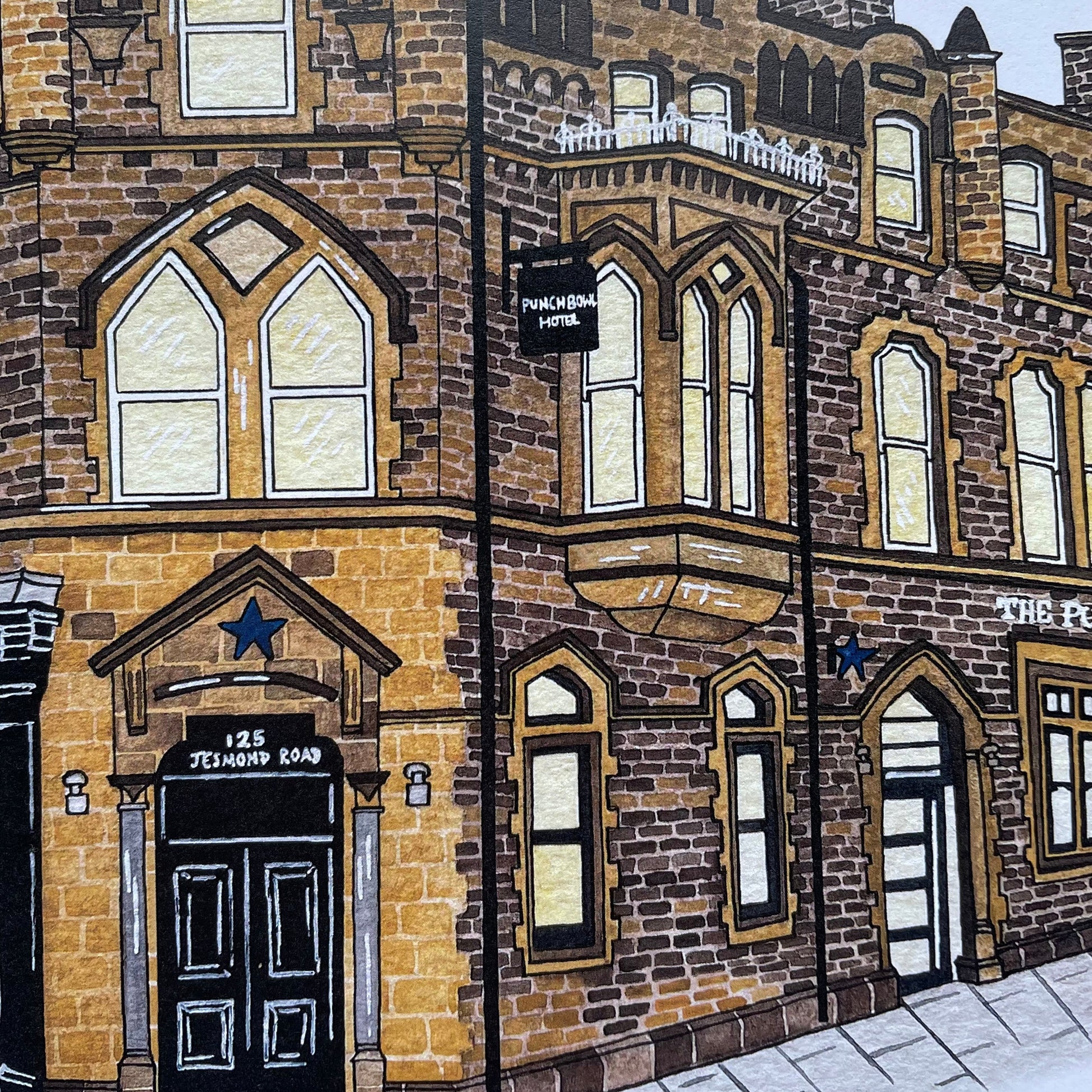Illustration of a row of Victorian-style buildings with detailed facades.